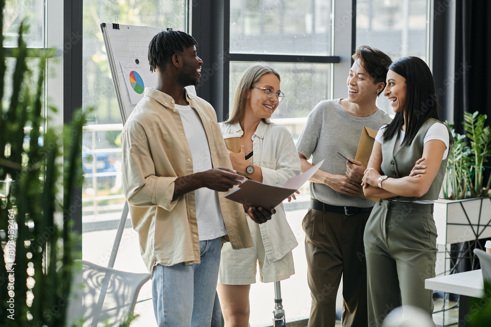 A diverse group of four individuals discuss ideas in a modern office setting A diverse group of four individuals discuss ideas in a modern office setting