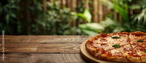 A pizza sitting on a table ...