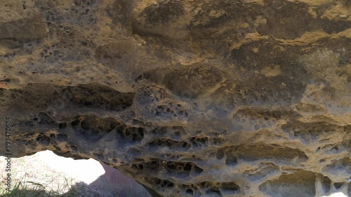 Close-up shot of Mushikui-iwa in Horon, Wakayama, Japan, sliding right. Captures the unique rock formations and scenic beauty. Ideal for nature films, travel documentaries, and promos. photo