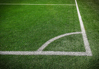 Freshly painted soccer corner on green lush grass