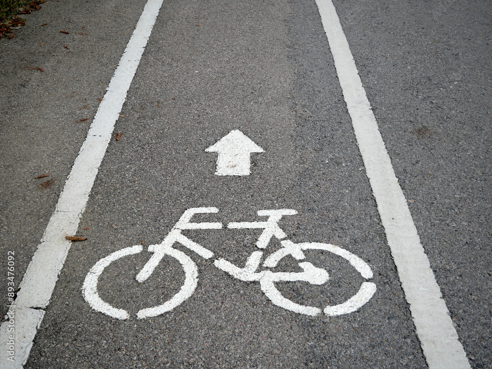 White bicycle symbol on the road for exercise. White bicycle symbol on the road for exercise.