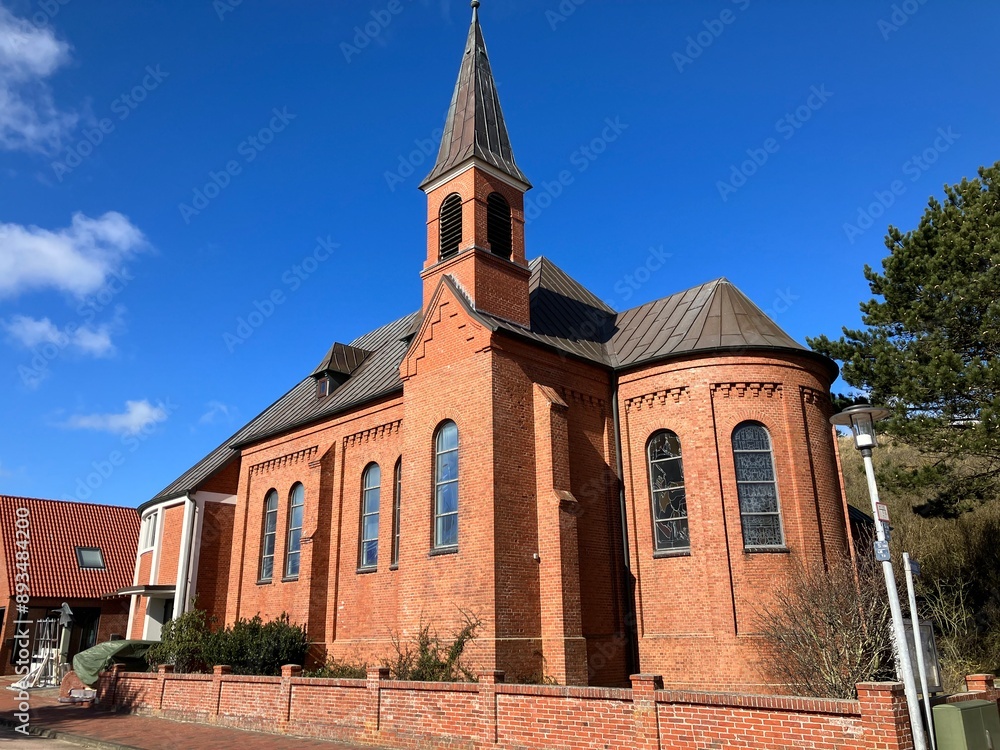 Obraz premium Historische Kirche auf der Nordseeinsel Juist