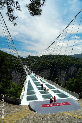 Glass bridge of Zhangjiajie China Tianzishan with blue sky, Zhangjiajie national forest park, China, concept of world heritage, avatar, heritage peak or cliff mountain, tourist attraction famous place