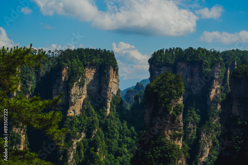 Zhangjiajie national forest park, China, Glass bridge of Zhangjiajie China Tianzishan with blue sky, concept of world heritage, avatar, heritage peak or cliff mountain, tourist attraction famous place