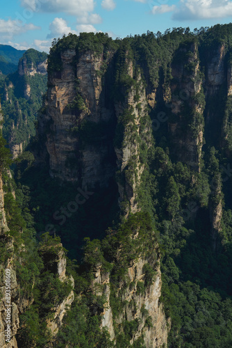 Zhangjiajie national forest park, China, Glass bridge of Zhangjiajie China Tianzishan with blue sky, concept of world heritage, avatar, heritage peak or cliff mountain, tourist attraction famous place