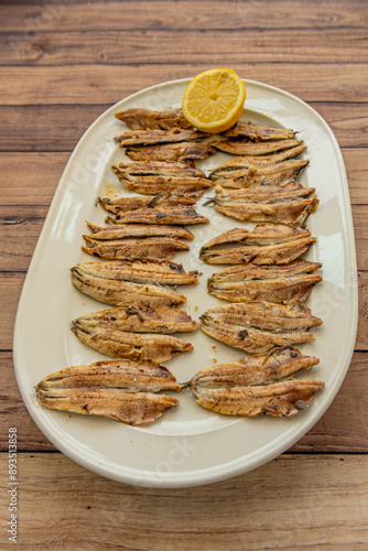 They are anchovies oasted or salted and then fried in boiling oil until they are crispy and golden photo