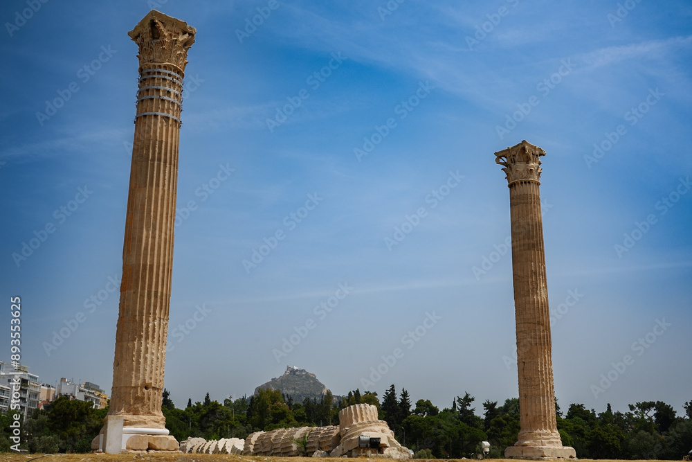 Temple of Olympian Zeus, Athens, Greece, Europe | Ancient Greek Architecture | Sunny Day | Daytime | Clear Blue Sky Temple of Olympian Zeus, Athens, Greece, Europe | Ancient Greek Architecture | Sunny Day | Daytime | Clear Blue Sky