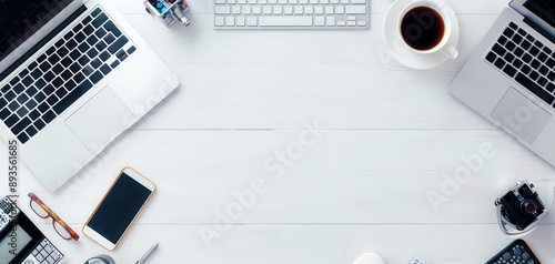 Workspace filled with laptops and gadgets, Startup business, Tech innovation