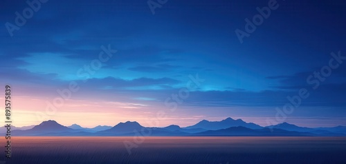 Twilight sky with shades of indigo and orange, silhouetting distant mountains, sky, evening tranquility