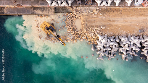 Photography Waterfront construction site with excavator