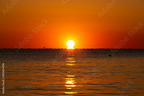 Beautiful sunrise over the morning sea.
