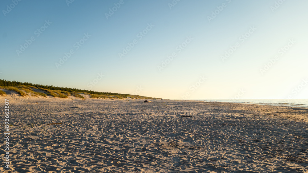 A wonderful wide, fine sand beach in the afternoon sun. Baltic Sea, Slajszewo, Poland