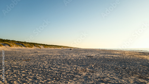 Obraz na płótnie A wonderful wide, fine sand beach in the afternoon sun. Baltic Sea, Slajszewo, Poland w salonie