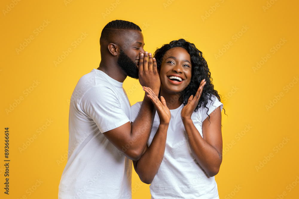 Φωτογραφία African American Man Sharing Secret With His Woman, girl is surprised, yellow st