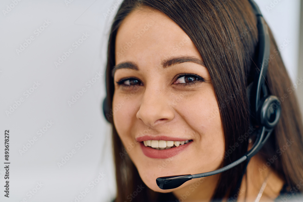 Friendly Call Center Agent Answering Incoming Calls with Headset Providing Remote Customer Service. Friendly Call Center Agent Answering Incoming Calls with Headset Providing Remote Customer Service.