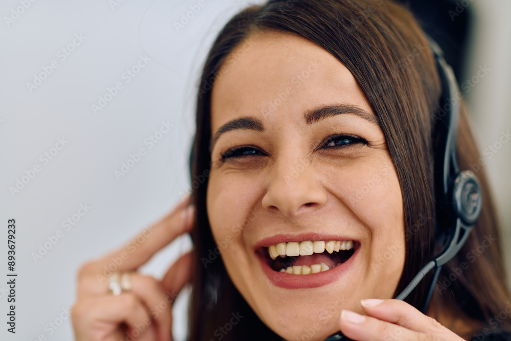 Friendly Call Center Agent Answering Incoming Calls with Headset Providing Remote Customer Service.