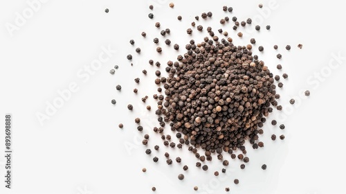 Black peppercorns powder on a white background