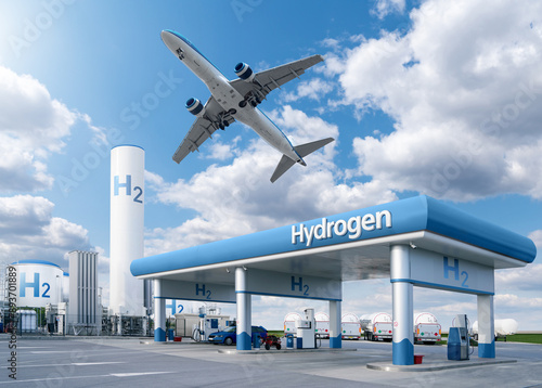 Fuel cell car at the hydrogen filling station and airplane in the sky. Clean mobility concept. photo