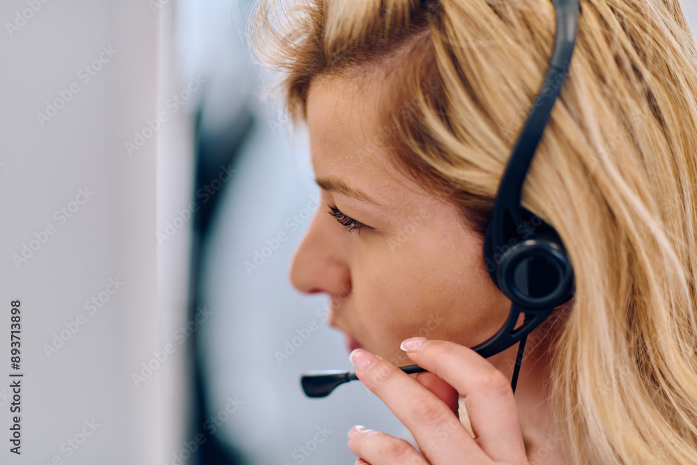 Friendly Call Center Agent Answering Incoming Calls with Headset Providing Remote Customer Service. Friendly Call Center Agent Answering Incoming Calls with Headset Providing Remote Customer Service.