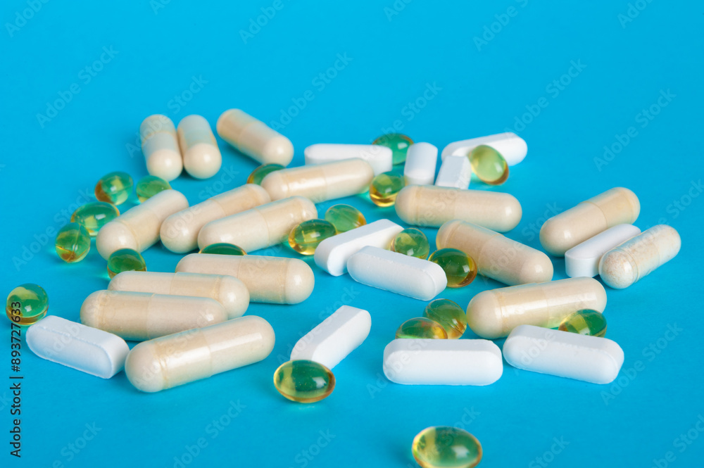 Weight Loss Pills and Measuring Tape, Diet Supplements Capsules, Obesity Lose Tablets, Color Drugs Pile Weight Loss Pills and Measuring Tape, Diet Supplements Capsules, Obesity Lose Tablets, Color Drugs Pile