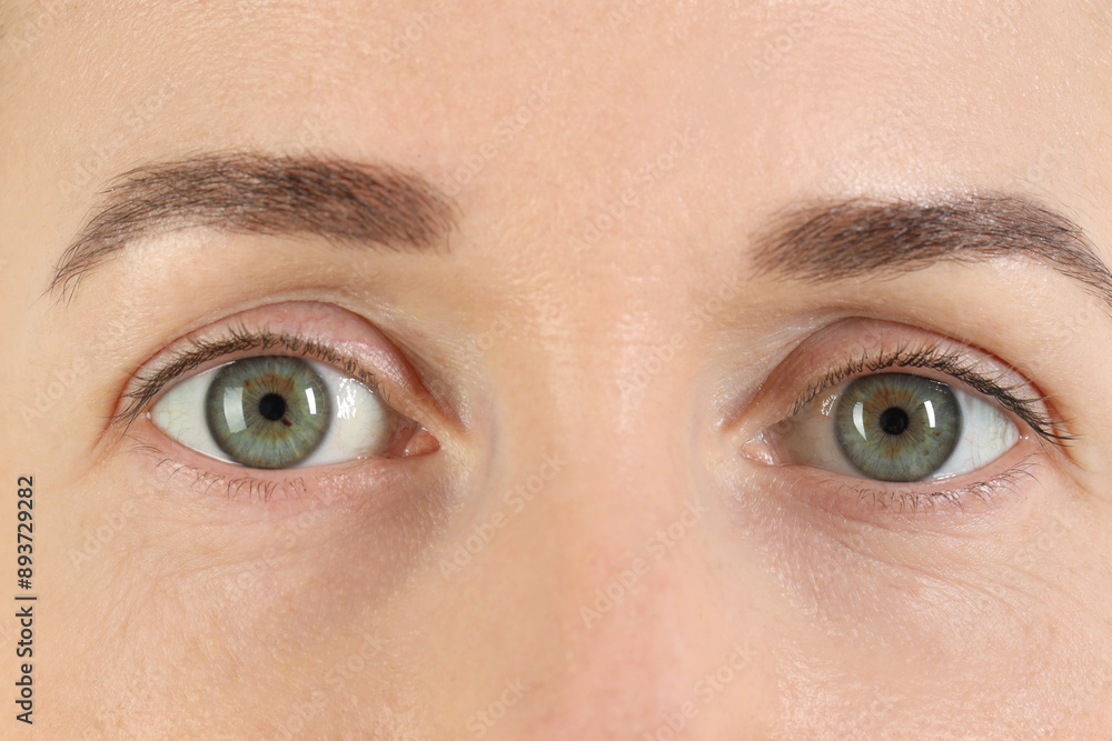Fototapeta premium Woman with beautiful green eyes, closeup view