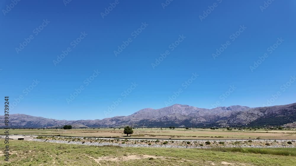 Kato Metochi Lassithi Crete. 09.06.2024. Water for irrigation flows through ffarmland at Kato Metochi on the Lassithi Plateau Crete, Kato Metochi Lassithi Crete. 09.06.2024. Water for irrigation flows through ffarmland at Kato Metochi on the Lassithi Plateau Crete,