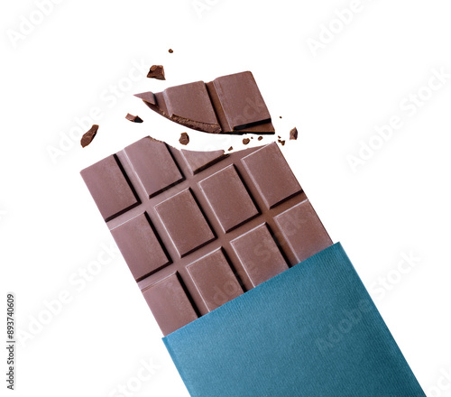 Broken bar of dark chocolate in wrapper close up isolated on a white background photo