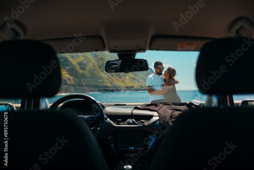 Intimate moment shared by a couple by the ocean in Sao Miguel.