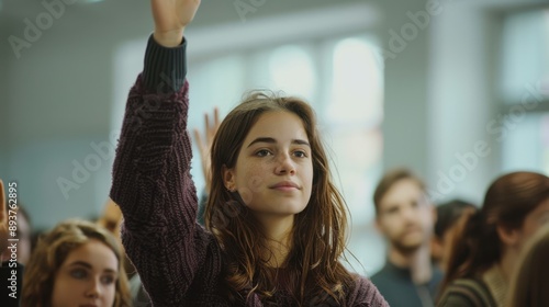 The student raising hand photo