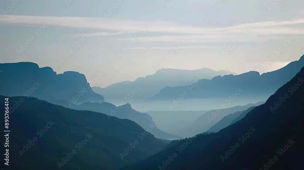 Fototapeta premium Blue Mountains Silhouettes in Early Morning Mist