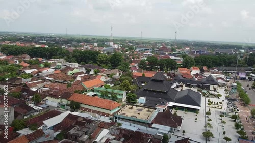 Aerial View of a Demak Town with Traditional Mosque Architecture photo