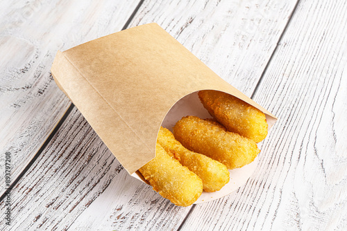 Breaded cheese sticks snack appetizer photo