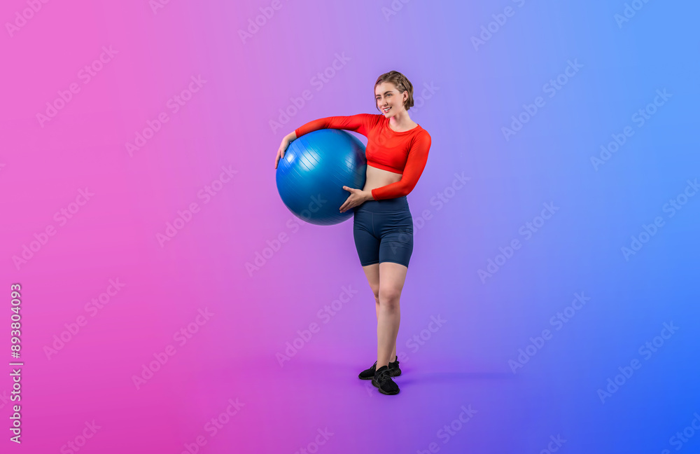 Full body length gaiety shot athletic and sporty young woman with fitness exercising ball in standing posture on isolated background. Healthy active and body care lifestyle. Full body length gaiety shot athletic and sporty young woman with fitness exercising ball in standing posture on isolated background. Healthy active and body care lifestyle.