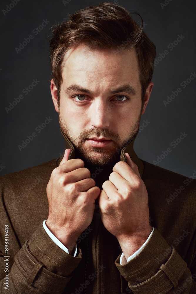 Serious, man and portrait with jacket in studio for trendy style, confidence and satisfaction. Designer fashion, relax and person with cool outfit on black background for edgy, clothes and pride Serious, man and portrait with jacket in studio for trendy style, confidence and satisfaction. Designer fashion, relax and person with cool outfit on black background for edgy, clothes and pride