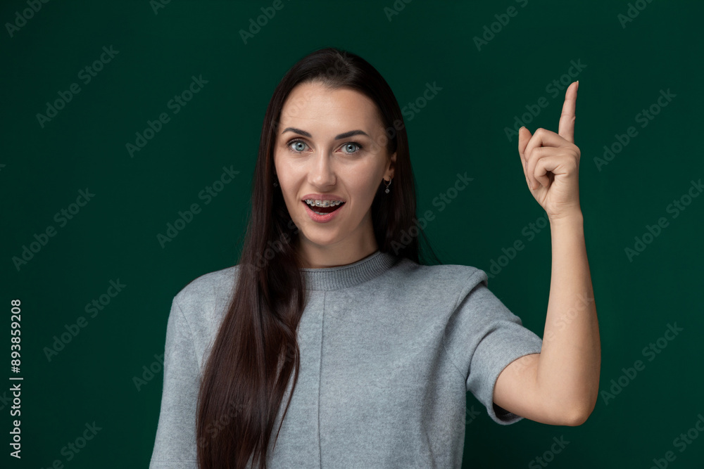 Woman Pointing at Something With Her Finger Woman Pointing at Something With Her Finger