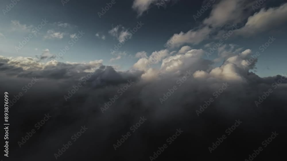 Aerial view Flying over the clouds timelapse with daytime sun. Flying through moving clouds with beautiful reflections. Air travel. Ideal for cinema, background Aerial view Flying over the clouds timelapse with daytime sun. Flying through moving clouds with beautiful reflections. Air travel. Ideal for cinema, background