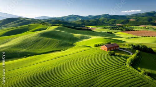 A peaceful rural landscape with rolling hills, a patchwork of fields, and a rustic farmhouse, high-resolution photo, realistic photo, cinematography, hyper realistic