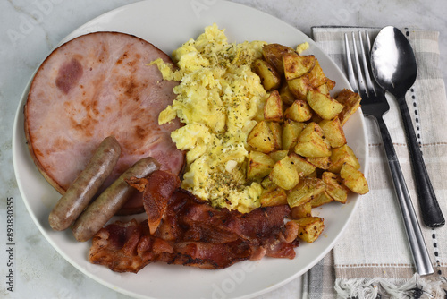 ham and scramble  egg s with  bacon and sausage photo