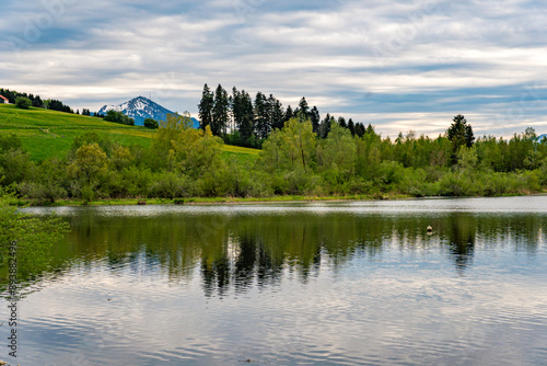 Leisurely hike in early summer at Rottachsee in the Allgau photo