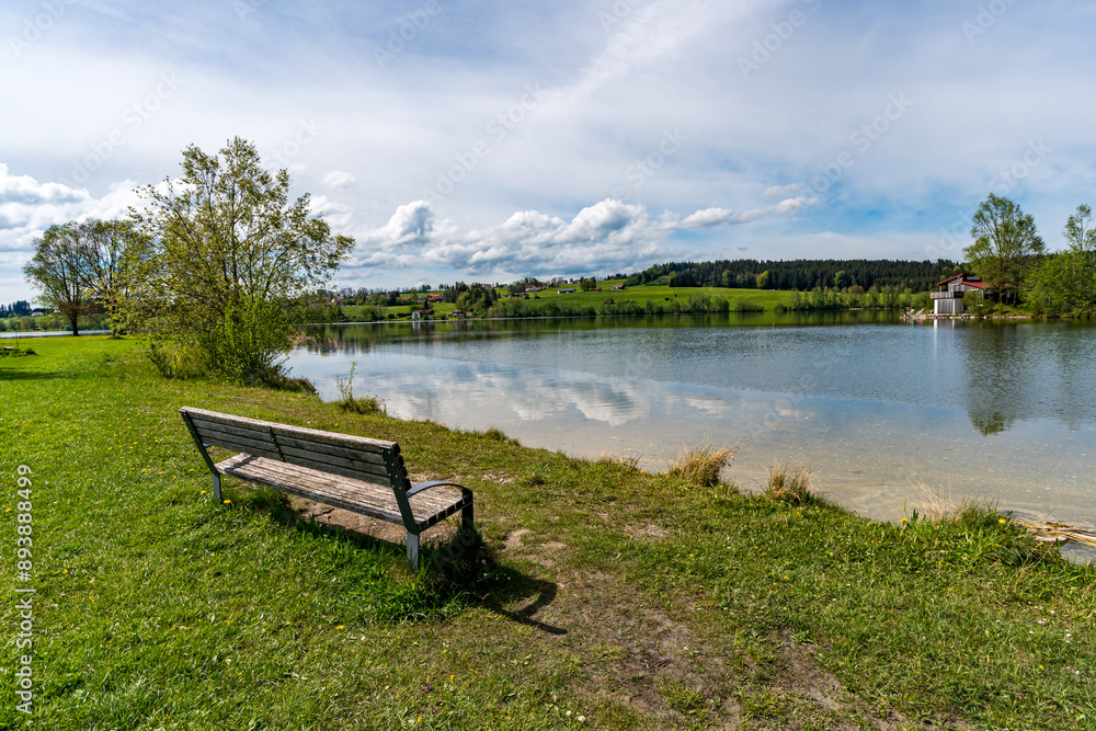 Leisurely hike in early summer at Rottachsee in the Allgau Leisurely hike in early summer at Rottachsee in the Allgau