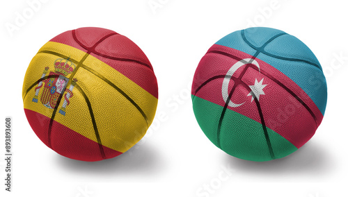 basketball balls with the national flags of azerbaijan and spain on the white background.