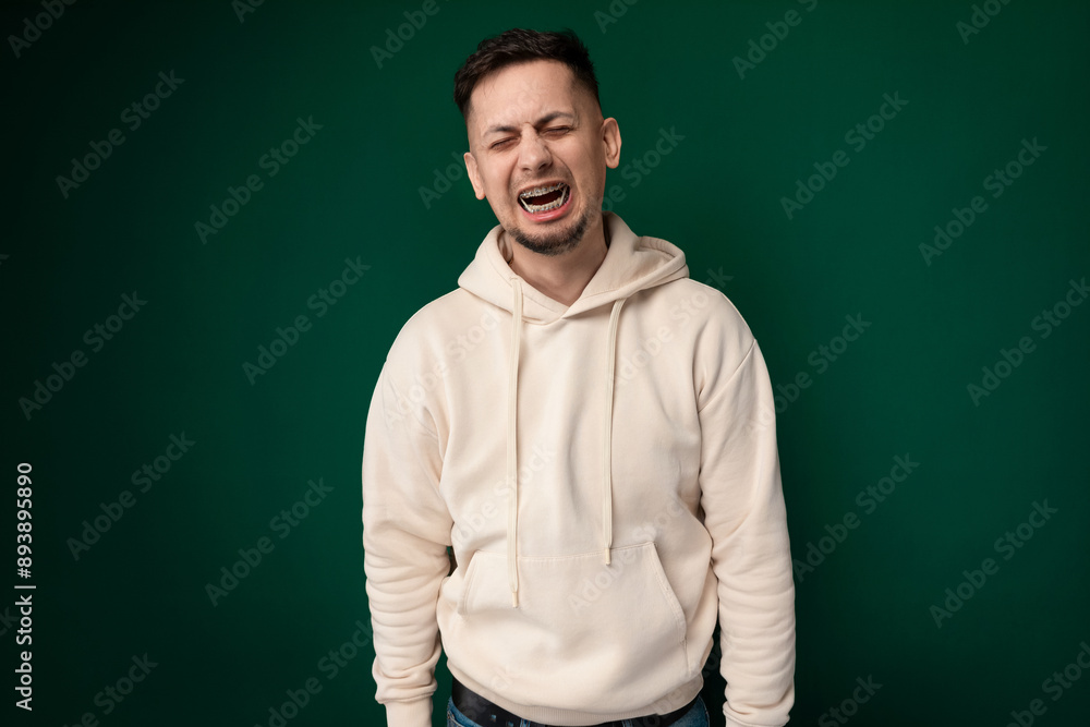 Man in White Hoodie Making Funny Face Man in White Hoodie Making Funny Face