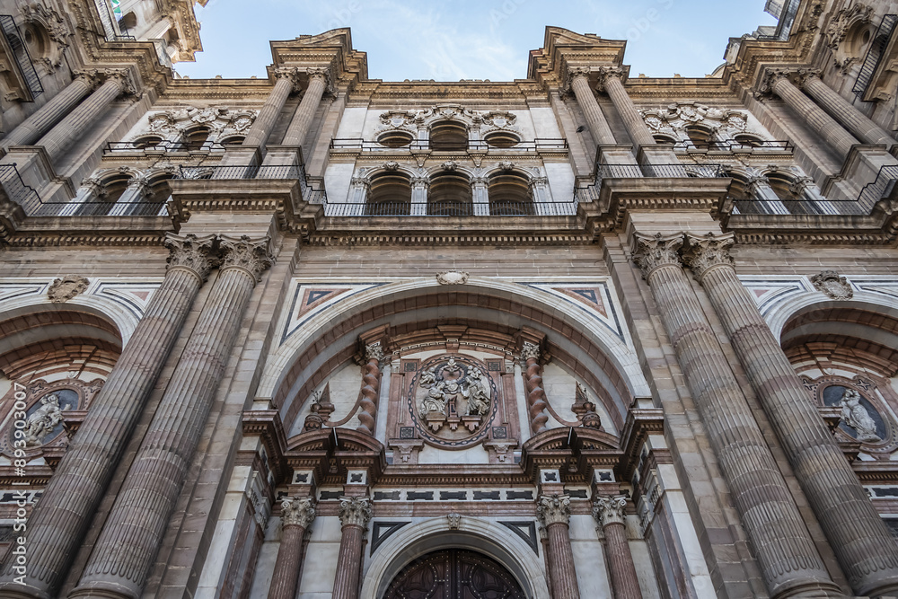 Fototapeta premium Architectural details of entrance to Malaga Cathedra. Cathedral is Roman Catholic Church (Santa Iglesia Catedral Basilica de la Encarnacion), was constructed in 1528 -1782. Malaga, Andalusia, Spain.