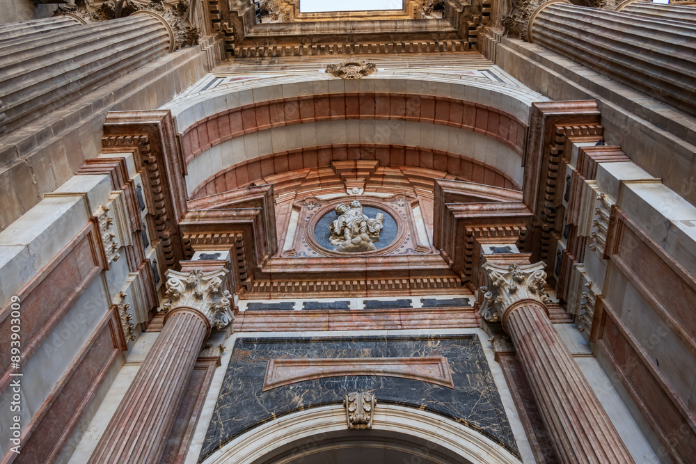 Obraz premium Architectural details of entrance to Malaga Cathedra. Cathedral is Roman Catholic Church (Santa Iglesia Catedral Basilica de la Encarnacion), was constructed in 1528 -1782. Malaga, Andalusia, Spain.