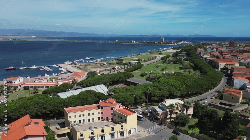 Aerial view of little town of Sant'Antioco houses at sunrise in italy Aerial view of little town of Sant'Antioco houses at sunrise in italy