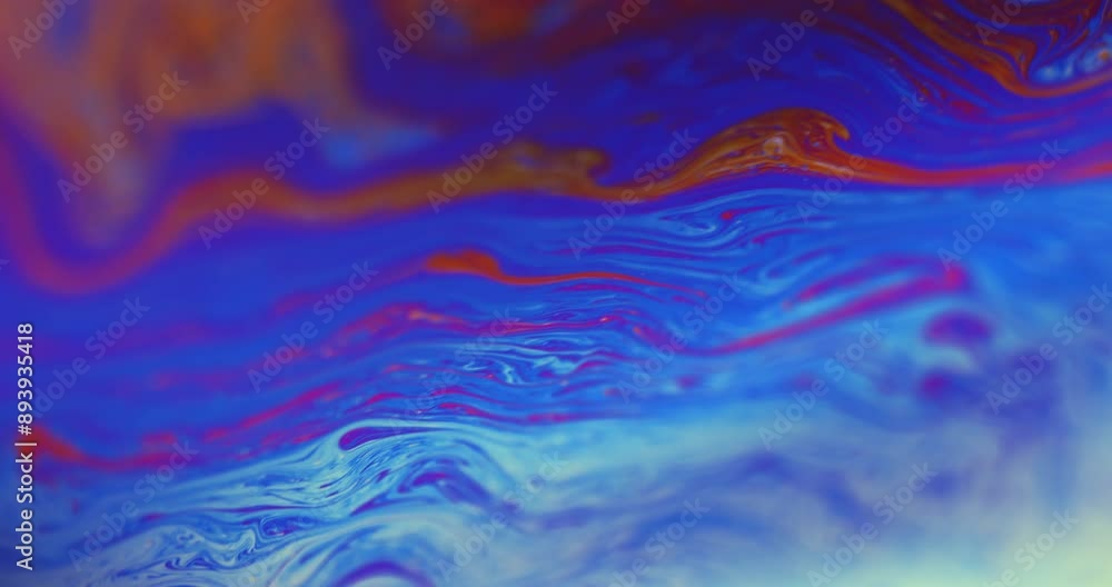 Spherical abstraction of iridescent blue, yellow and red colors with soft focus. Rainbow multilayer film. Natural environment. Spherical abstraction of iridescent blue, yellow and red colors with soft focus. Rainbow multilayer film. Natural environment.