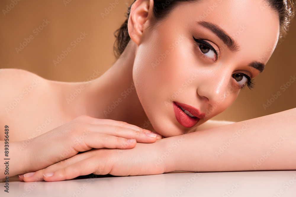 Photo of attractive pretty girl lying white table have glamour makeover look isolated pastel color background Photo of attractive pretty girl lying white table have glamour makeover look isolated pastel color background