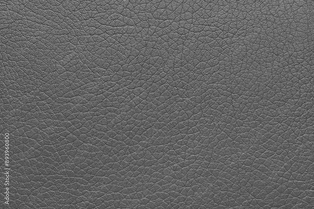 Natural, genuine gray leather texture, structure of glossy leatherette macro background Natural, genuine gray leather texture, structure of glossy leatherette macro background