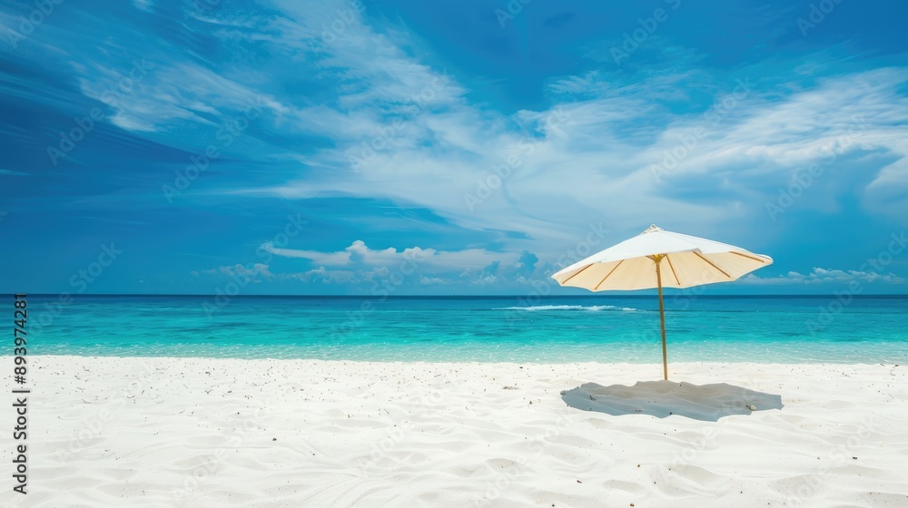 Sandy beach with white sand blue sky and umbrella Sandy beach with white sand blue sky and umbrella