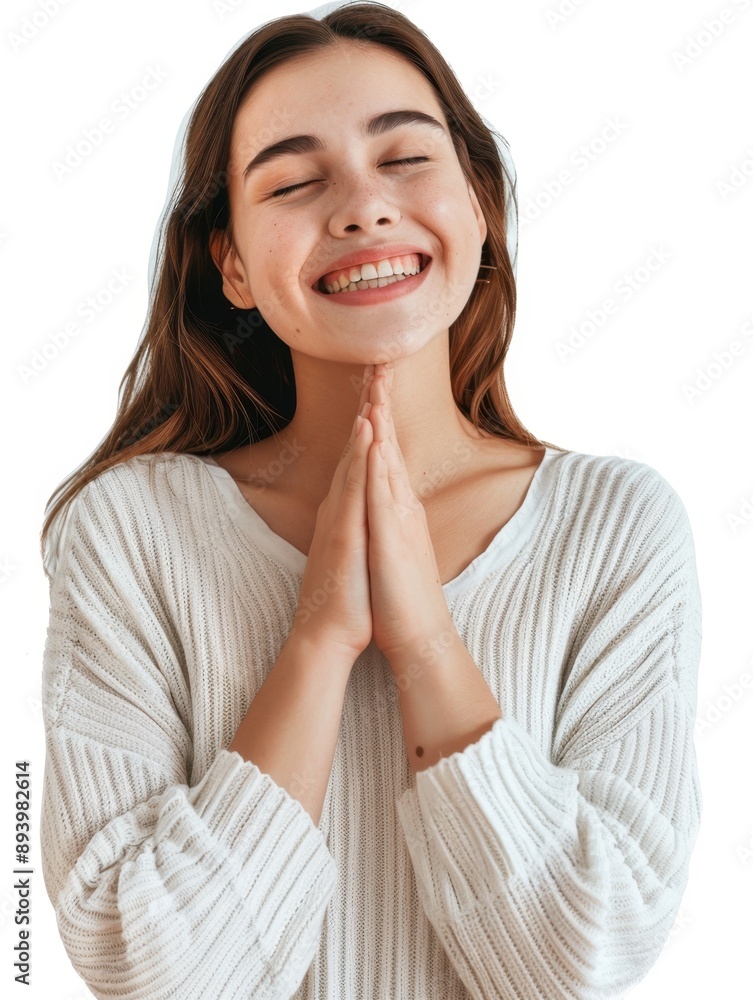 Young woman smiling, showing gratitude or faith Young woman smiling, showing gratitude or faith